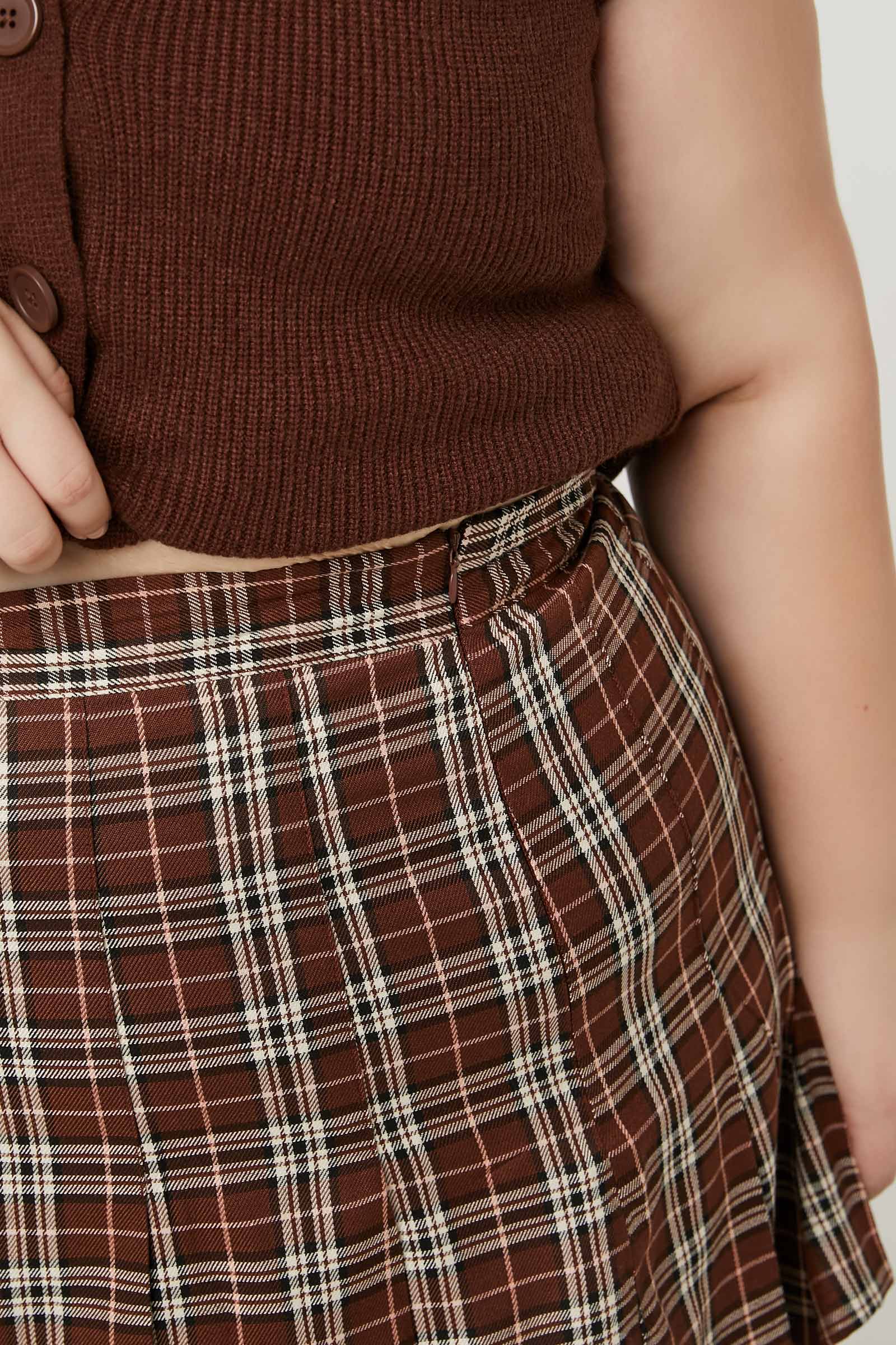 Mini jupe plissée à carreaux